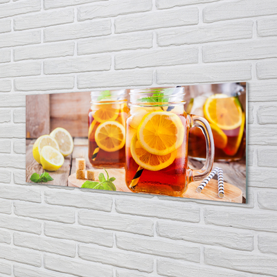 Akrilo stiklo paveikslas Šalta arbata su citrusinių vaisių šiaudeliais