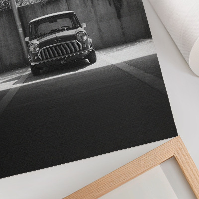Plakatas svetainei Klasikinis juodai baltas automobilis garaže