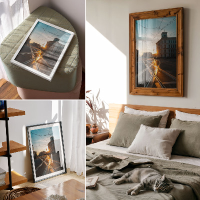 Plakatas Besileidžianti saulė virš miesto su architektūra