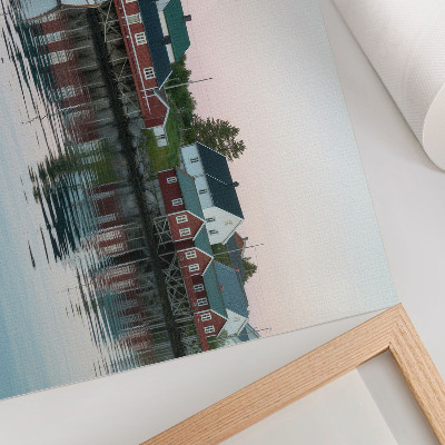 Plakatas Kubistiniai raudoni namai prie ežero spinduliuoja