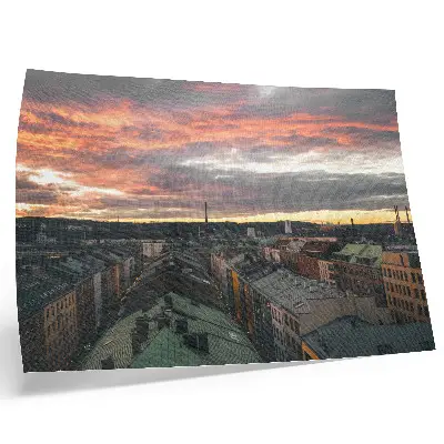 Spauda ant drobės saulėlydis virš miesto panoramos