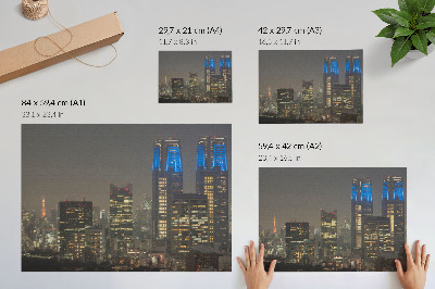 Plakatas ant drobės Apšviesti dangoraižiai naktiniam miestui modernūs pastatai
