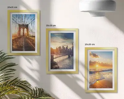 Įrėmintų paveikslų rinkinys su tiltų ir saulėlydžio miesto peizažu