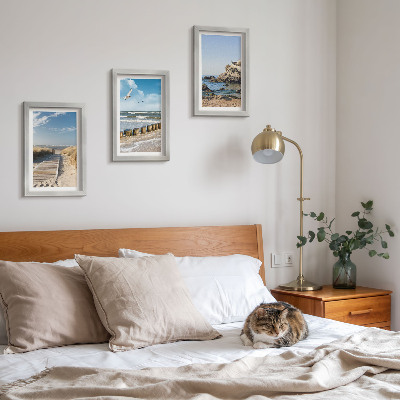 Įrėmintų paveikslų rinkinys Paplūdimys su mediniu taku, jūra ir pajūrio uolos