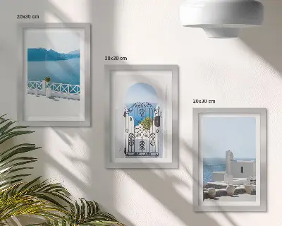 Įrėmintų paveikslų rinkinys su vaizdu į jūrą ir baltus Graikijos pastatus