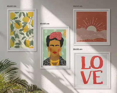 Paveikslų kompozicija ant sienos su citrinų motyvu, užrašu ir Frida Kahlo peizažu