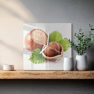 Kvadratinis laikrodis iš stiklo Akmenys smėlyje