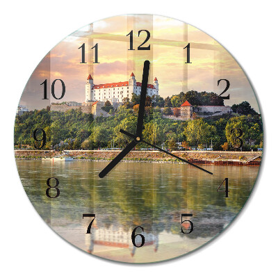 Apvalus laikrodis iš stiklo Pilis prie upės